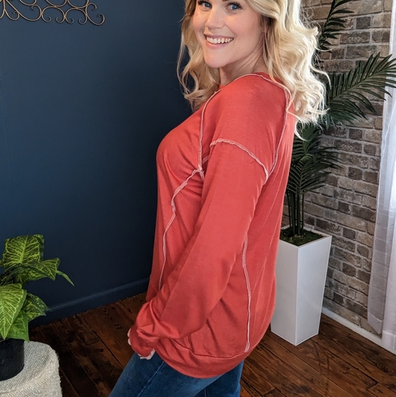 Burnt orange reversed stitching long sleeve top.. Sizes small, medium, 2X, 3x - Picture 2 of 2